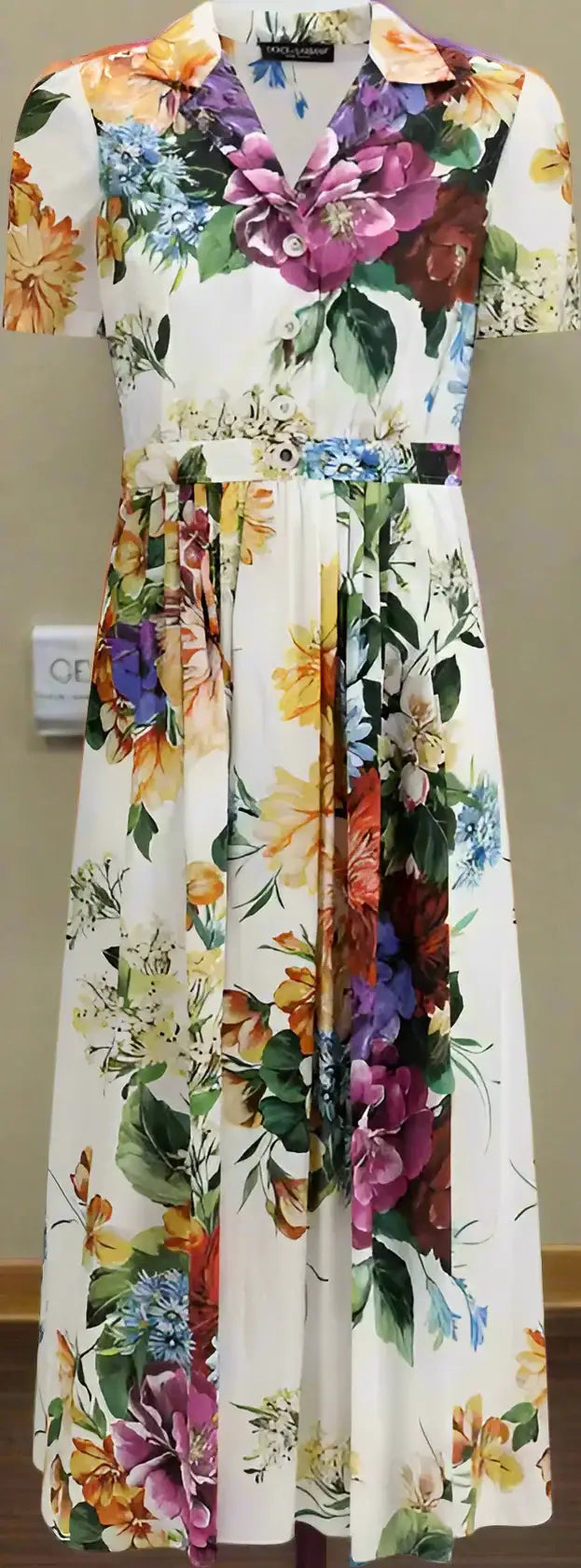White floral midi dress with flower bouquet print, tie waist, and collared v-neck