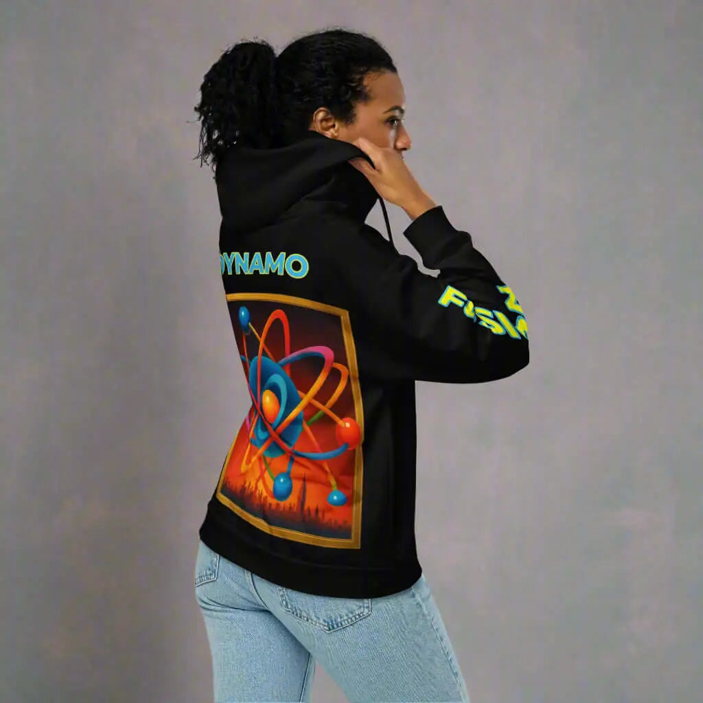 Woman wearing DYNAMO black unisex zip hoodie with colorful atom graphic and fusion design