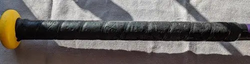 Black-wrapped Easton Octane league baseball bat handle with yellow knob for youth play