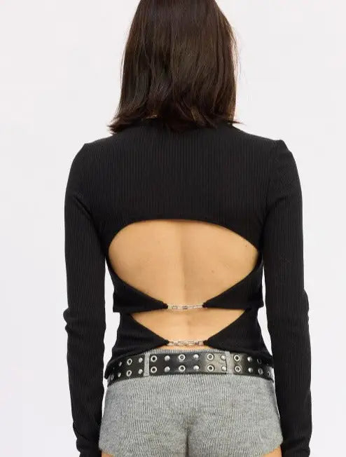 Black ribbed long-sleeve top with open back and chain details from Emory Park