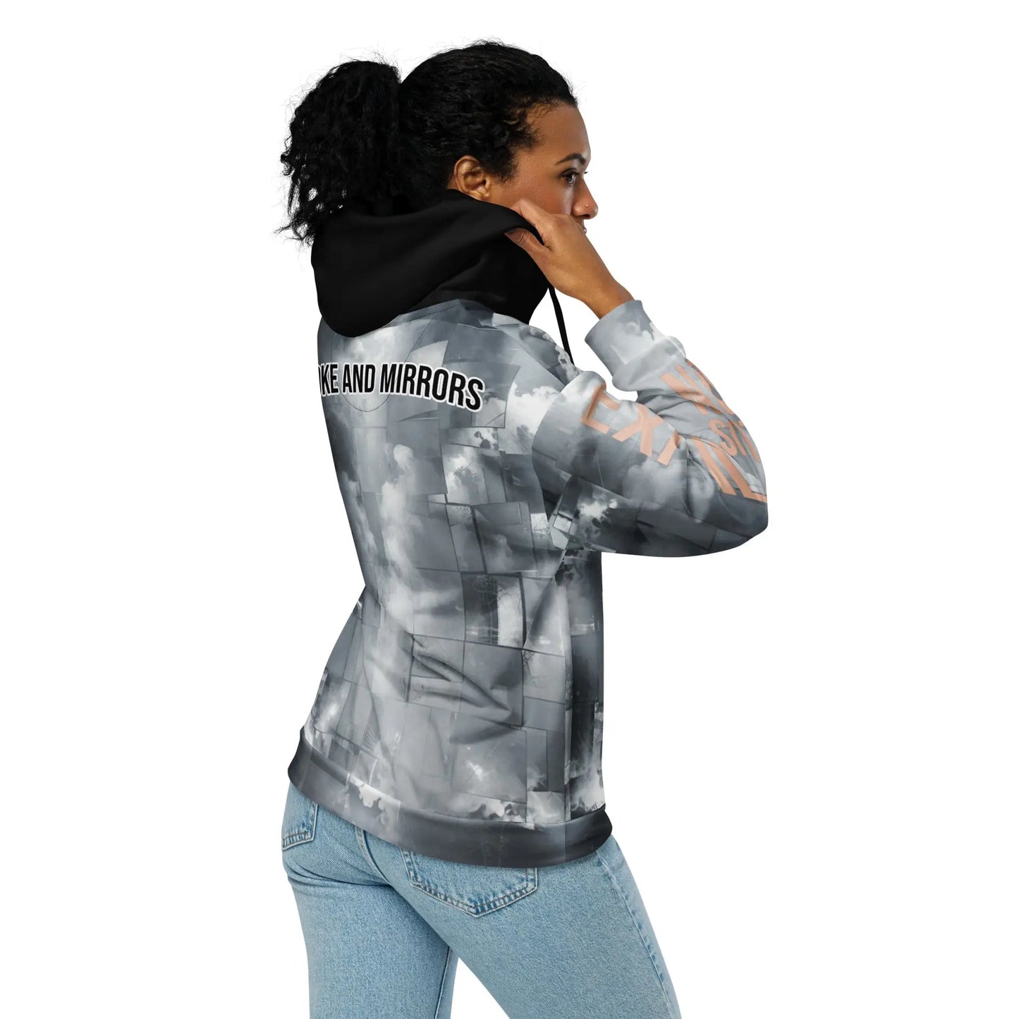 Gray tie-dye exit illusion hoodie with black hood and light-wash blue jeans