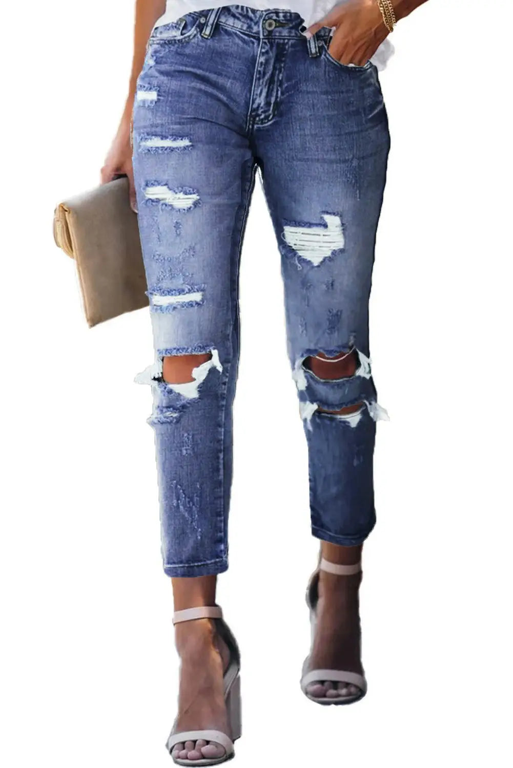 Fading distressed holes light-wash blue skinny jeans with ankle-strap heels