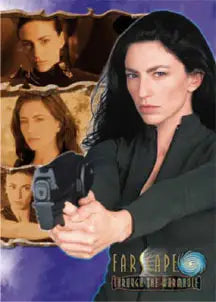 Trading card of a woman with dark hair holding a gun from Farscape series