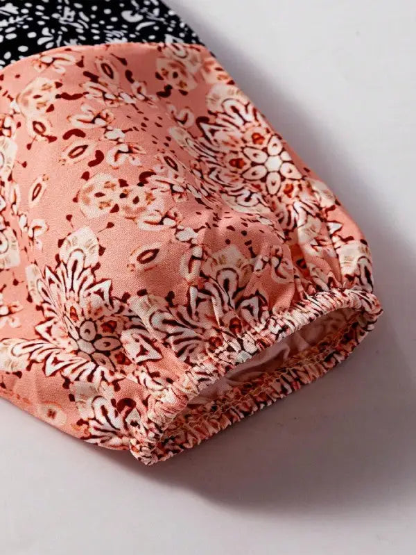 Close-up of pink floral patchwork blouse sleeve with elastic cuff for Floral Patchwork Top