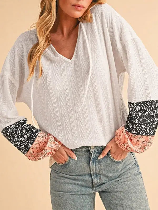 White waffle knit floral patchwork long-sleeve top with peach-colored floral sleeves