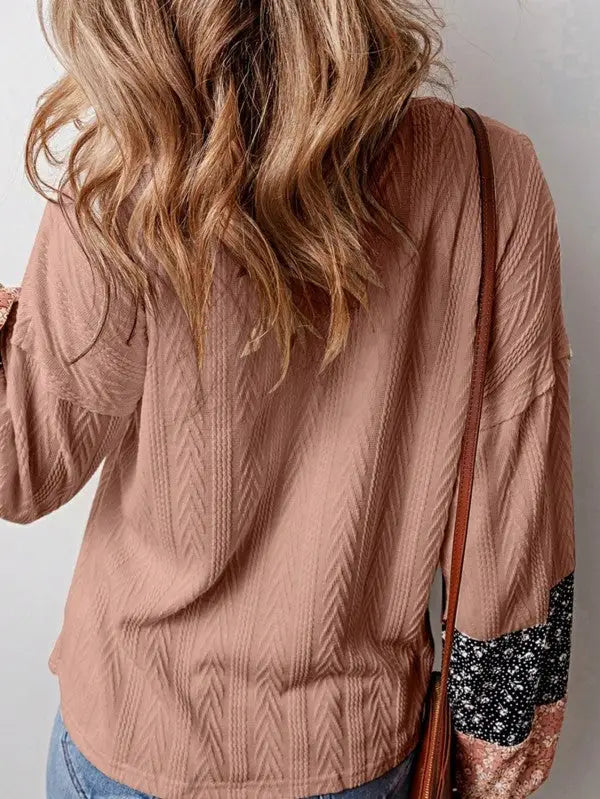 Women’s dusty rose floral patchwork long-sleeved top with textured chevron pattern