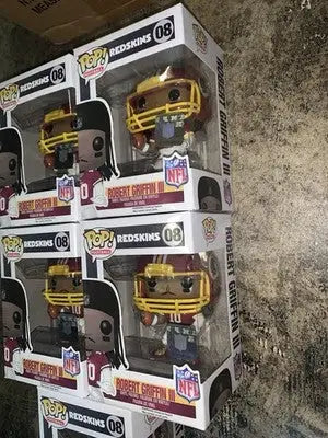 Funko Pop Robert Griffin III figures from Redskins Vaulted NFL Commanders case