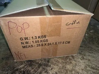 Cardboard shipping box holding Funko Pop Robert Griffin III NFL collectible cases