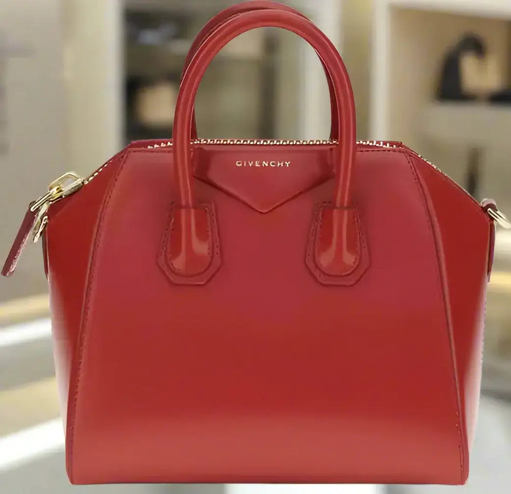 Shiny red leather GIVENCHY Antigona mini handbag with top handles and zipper closure