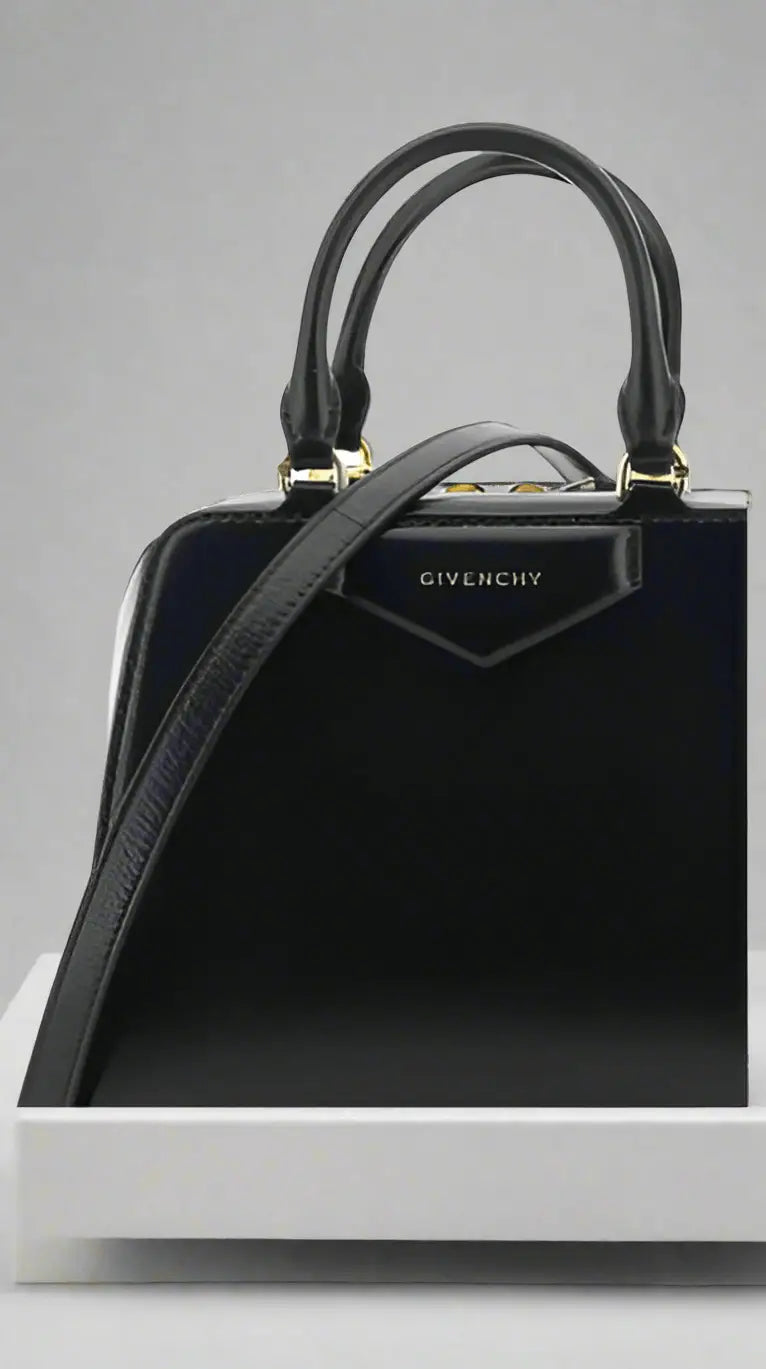 Black leather Givenchy Antigona Cube Mini Handbag with top handles and shoulder strap