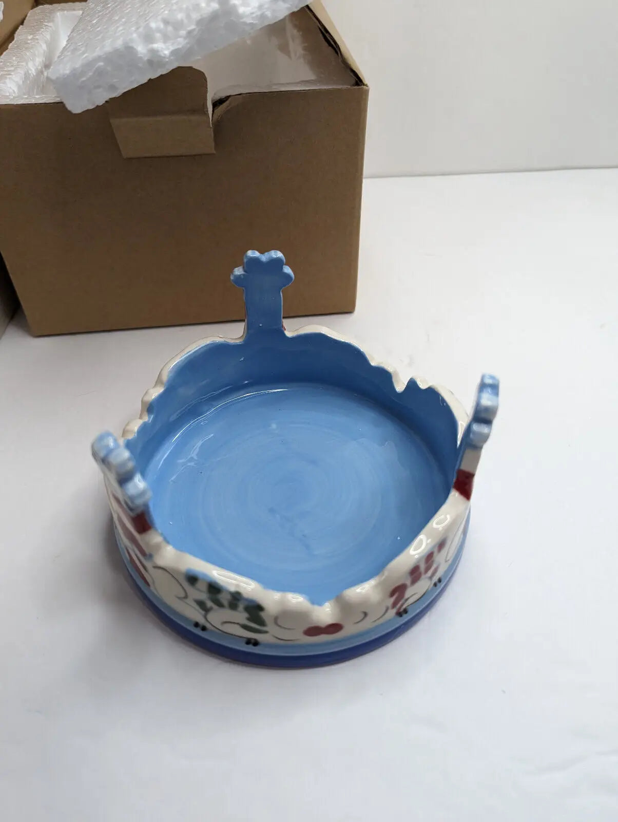 Blue crown-shaped trinket dish from Gold Canyon Votive Seasonal Snow Bears Set