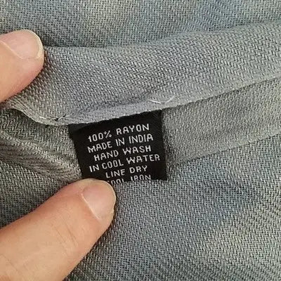 Clothing label with care instructions on Gray Pashmina Style Oversized Scarf Shawl