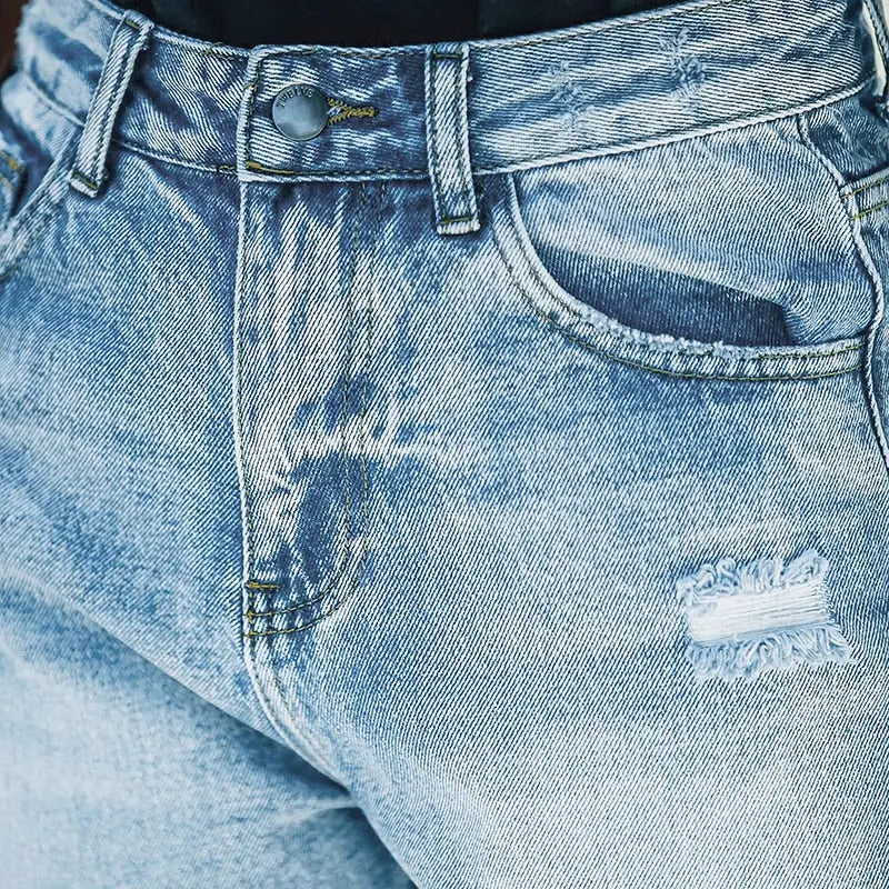 Light blue distressed denim high waisted ripped blue shorts with button closure and front pockets