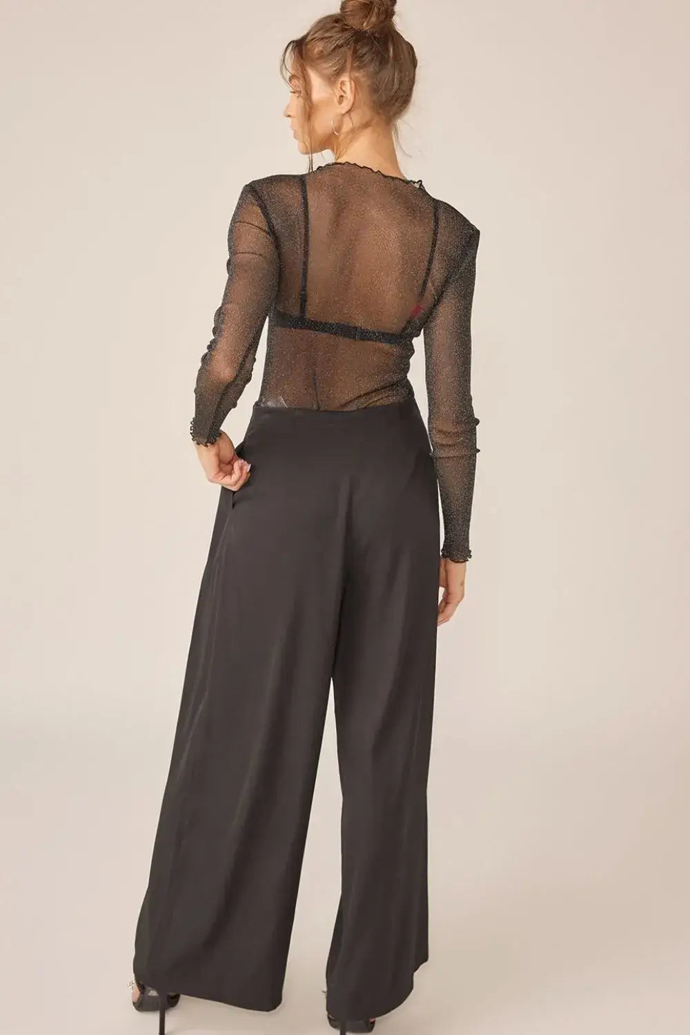 Women’s black sparkling glitter long sleeve sheer top with high-waisted wide-leg pants