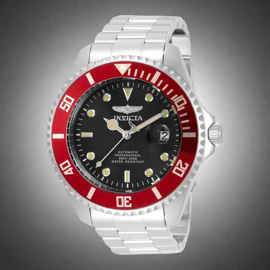 Silver-toned stainless steel Invicta men’s diver’s watch with black dial and red bezel