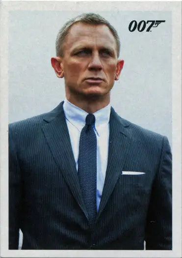 Man in dark suit and blue tie with James Bond 007 text in trading cards collection
