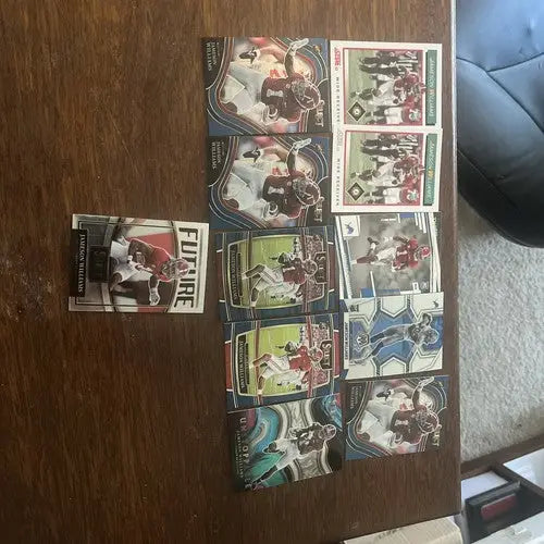 Jameson Williams sports trading cards featuring hot young rookie in crimson and white uniforms
