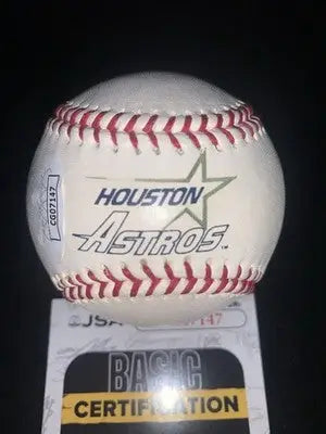 White Houston Astros baseball with red stitching and Jeff Bagwell signed logo