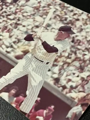 Baseball player swinging bat in Joe DiMaggio New York Yankees photo for trading cards