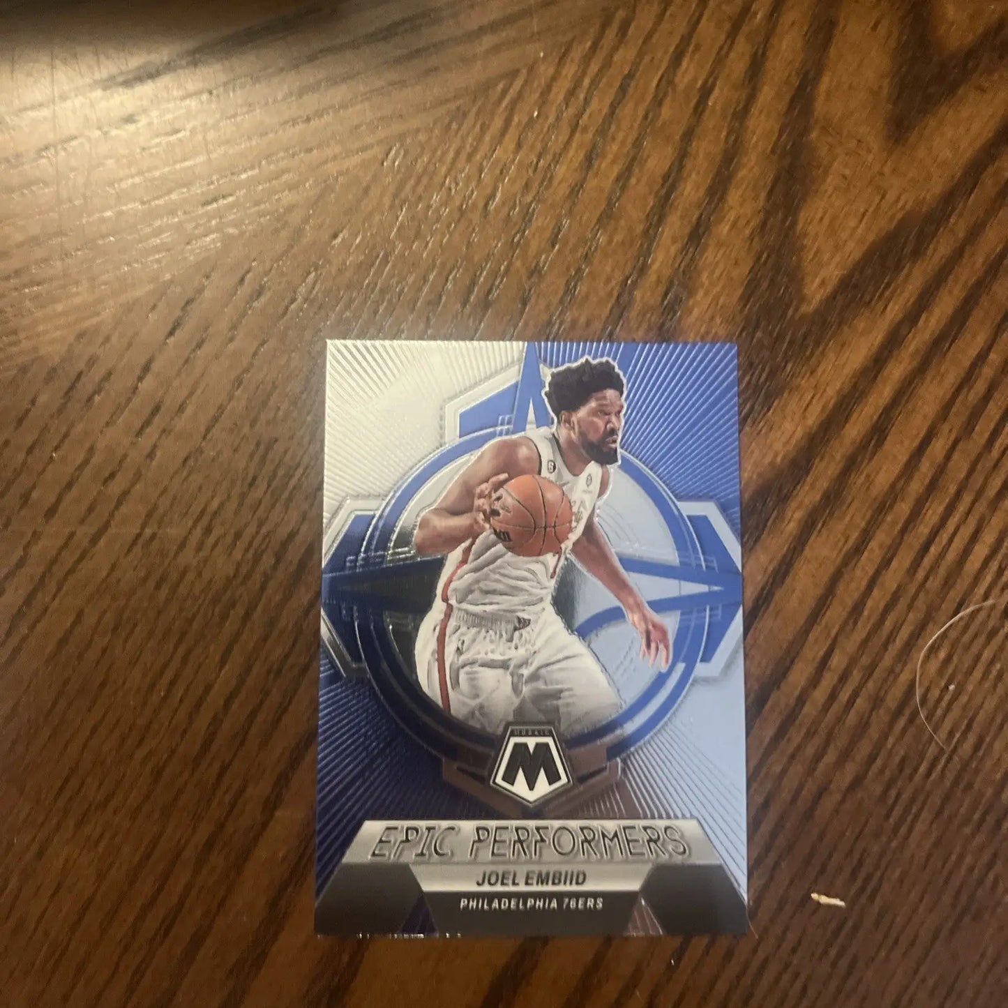 Joel Embiid basketball card featuring in a premium Joel Embiid card lot collection