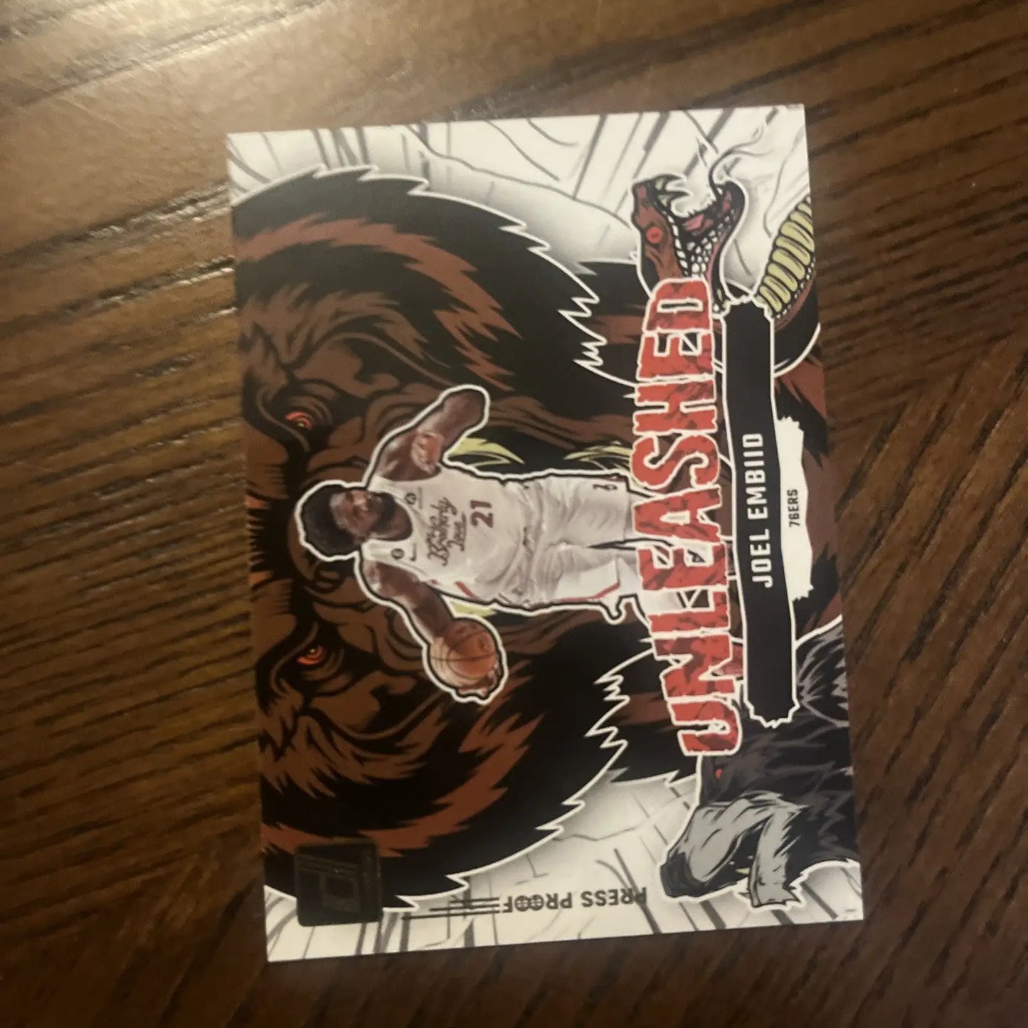 Joel Embiid basketball card featured in a premium Joel Embiid card lot collection
