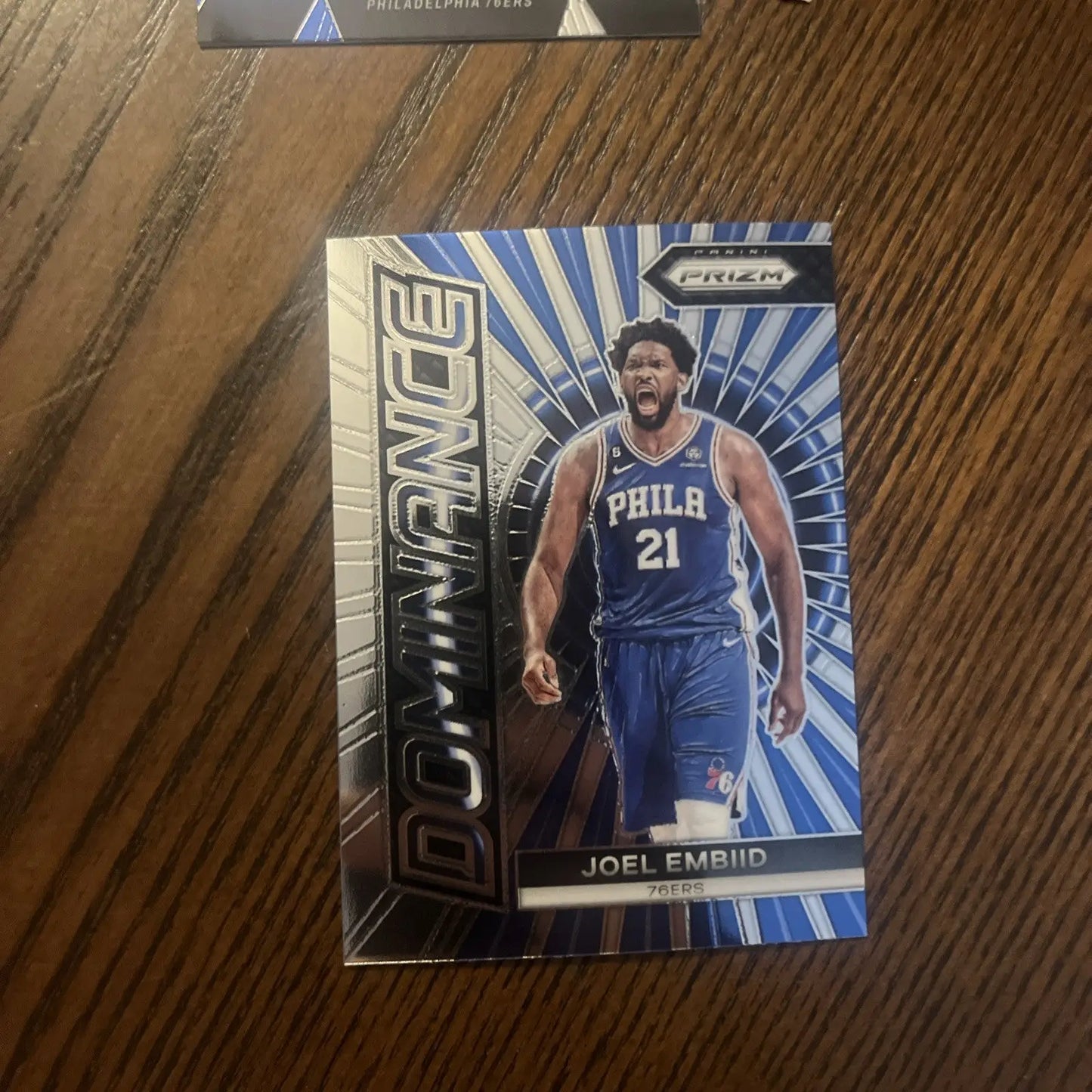 Joel Embiid basketball card from a premium trading card lot showcasing his stats and highlights