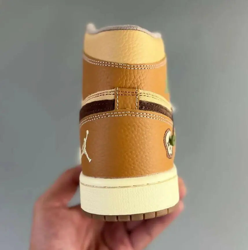 Brown and tan Air Jordan sneaker with white Jumpman logo from Jordan 1 High Zion Williamson Voodoo, fast shipping