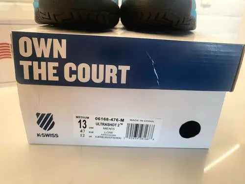 K-Swiss Ultrashot 2 aqua blue tennis shoe box on display in packaging