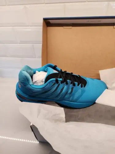 K Swiss Ultrashot aqua blue tennis shoe with black laces for men size 13
