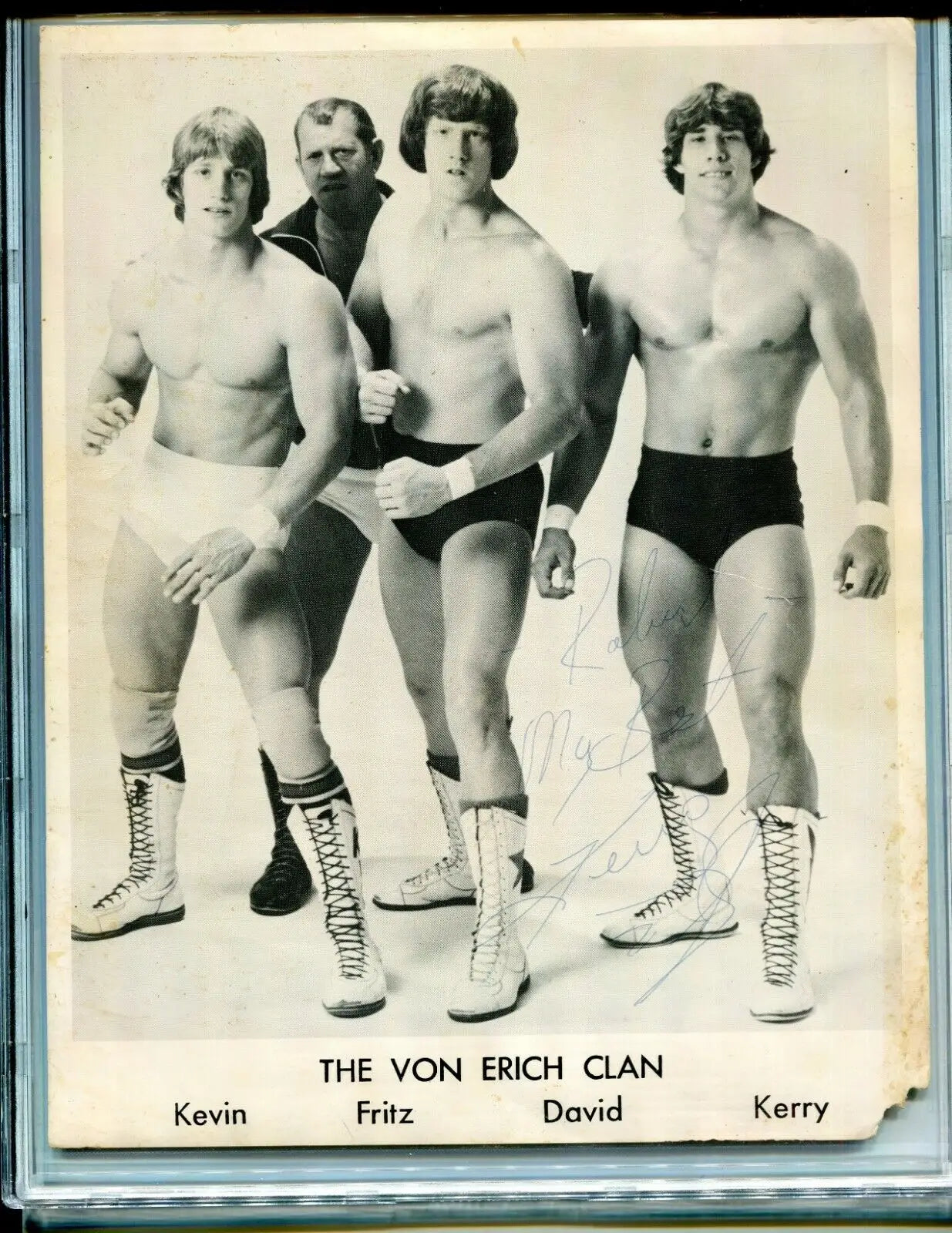 Signed Kerry Von Erich wrestling team photo featuring the Von Erich family