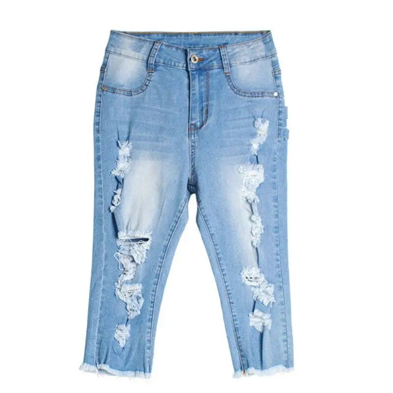 Light-wash distressed denim capri jeans with frayed hems, perfect destroyed ripped jeans