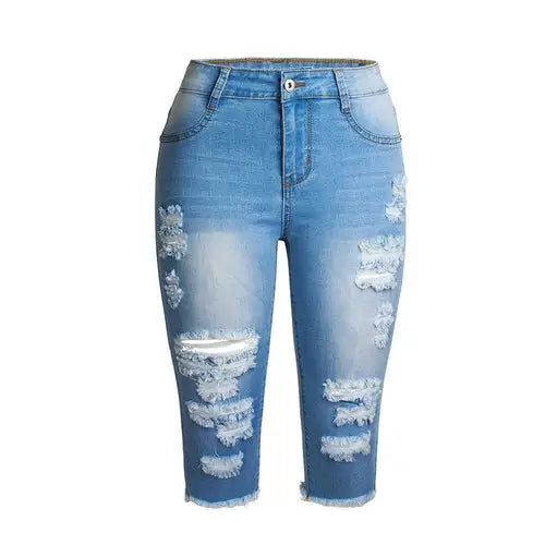Light blue distressed denim capri jeans with button fly and frayed hems, perfect destroyed ripped jeans