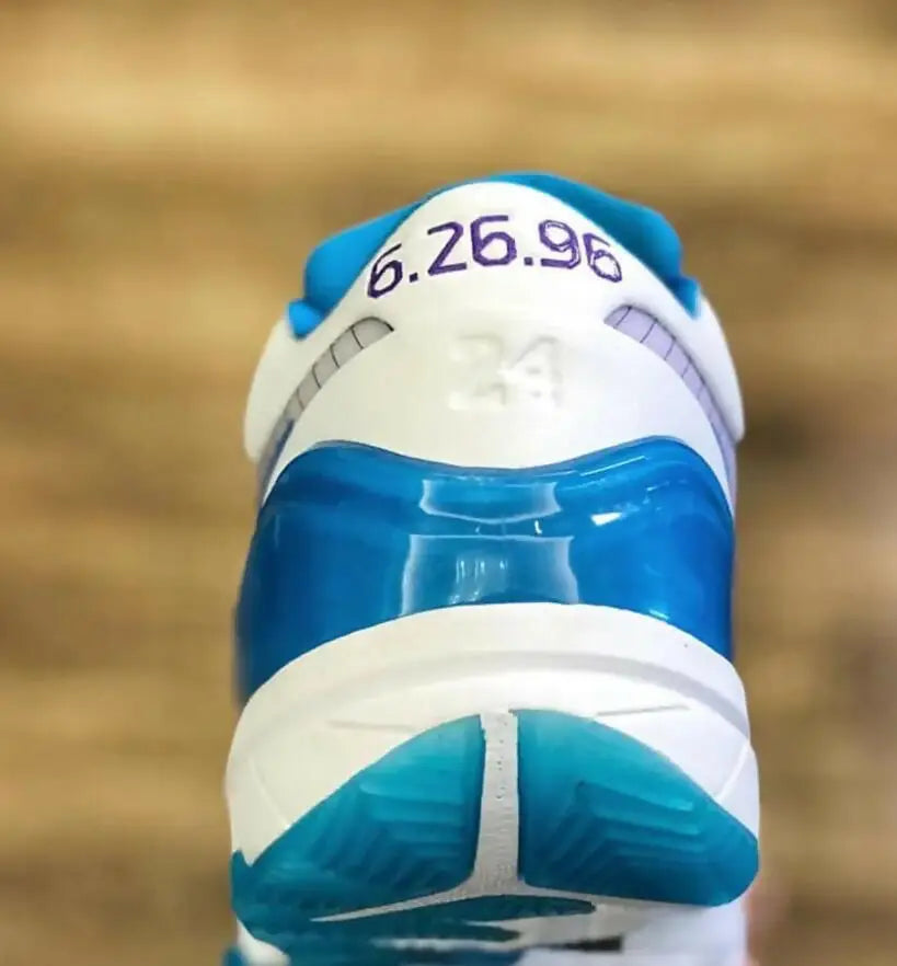Kobe 4 Protro Draft Day Hornets athletic shoe with white and blue design, fast shipping