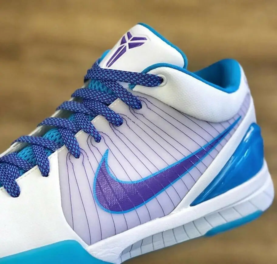 Nike Kobe 4 Protro Draft Day Hornets basketball shoe with white, blue, purple accents