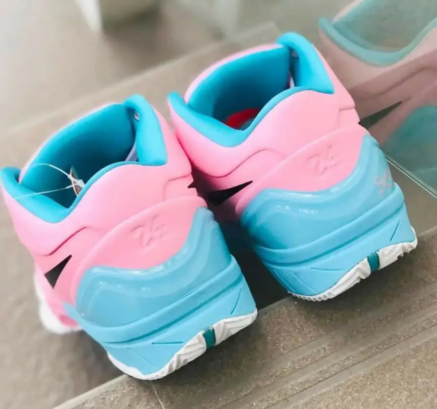 Pink and light blue Kobe 6 Demar Derozan athletic shoes with fast shipping available in business days