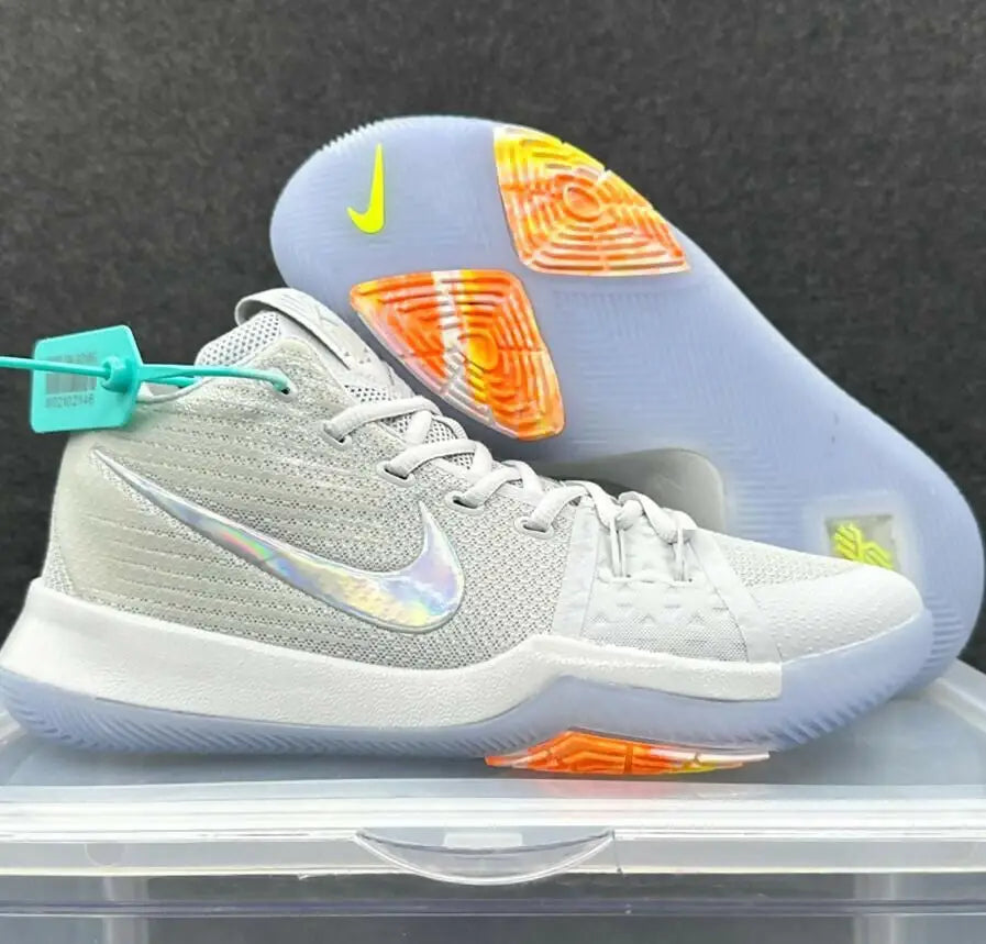 Light gray Nike Kyrie 3 basketball shoe with iridescent swoosh and translucent sole