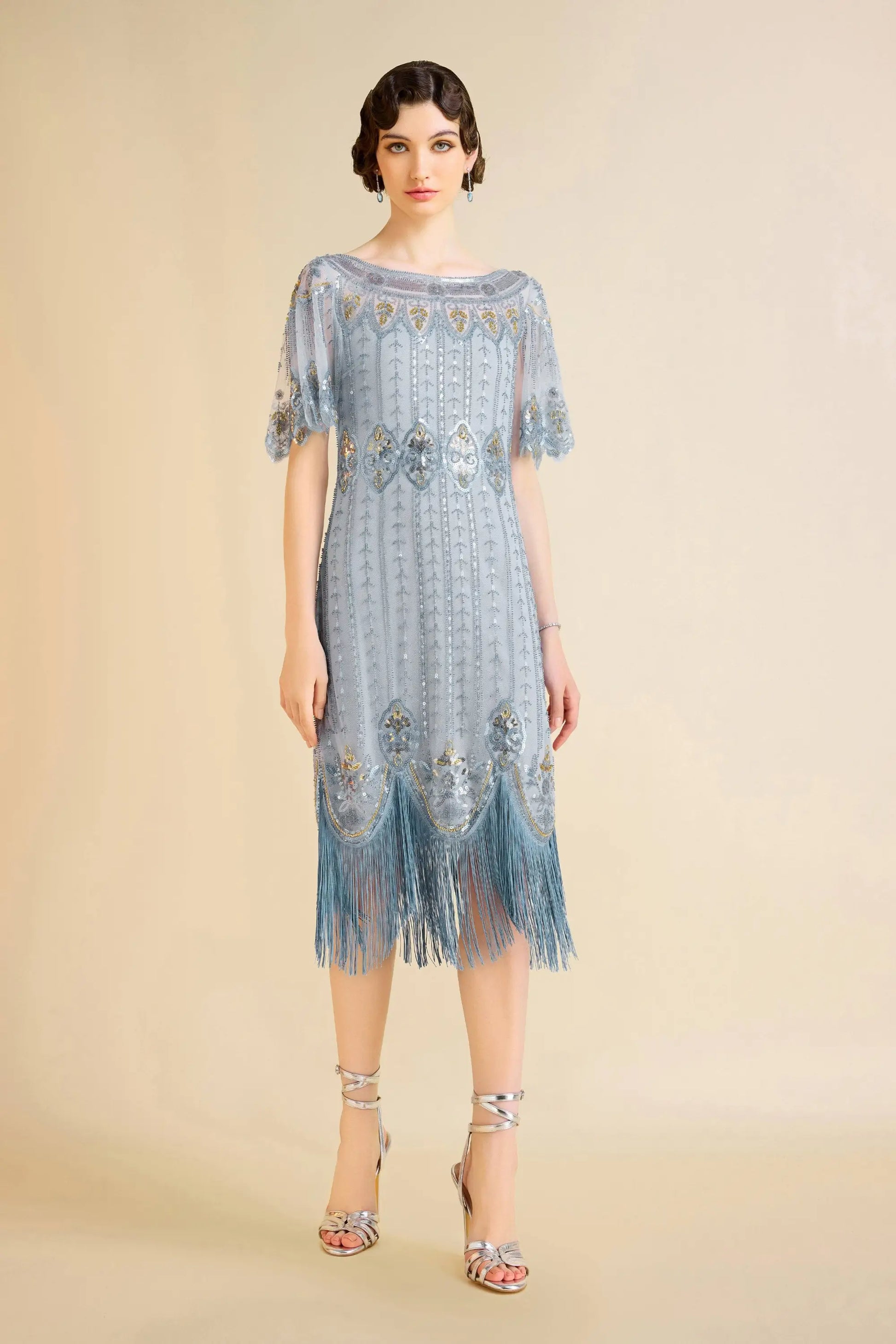 Sky blue beaded flapper dress with fringe and sequins, perfect for cocktail events