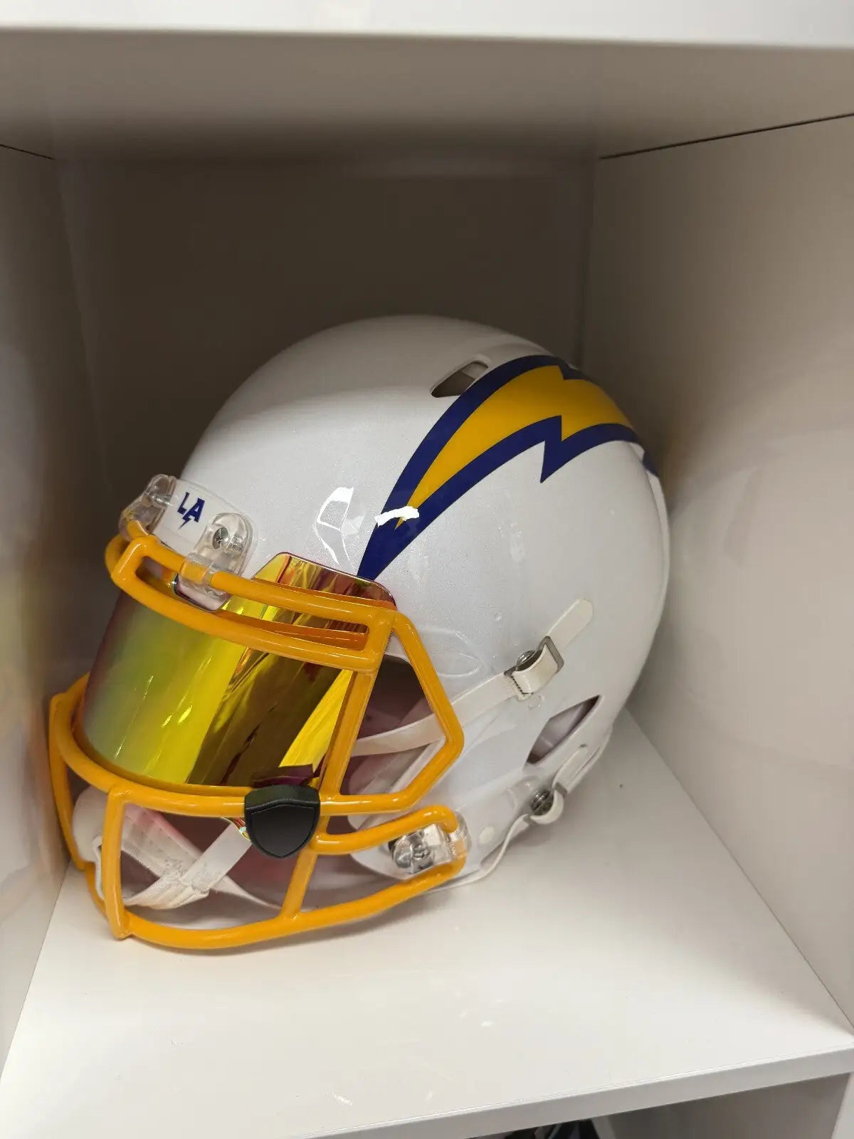 White football helmet with yellow face mask lightning bolt, McConkey Chargers authentic autographed