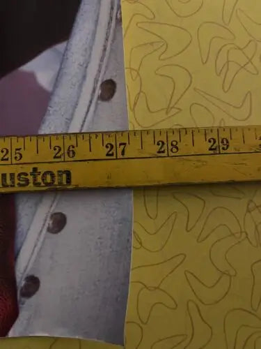 Yellow measuring tape featured in Lorrie Morgan Signed Autograph Something In Red poster
