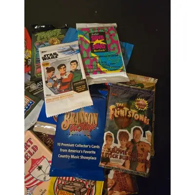 Stack of trading card packs from Lot of 15 Non-Sport Card Packs Random Mixed Packs