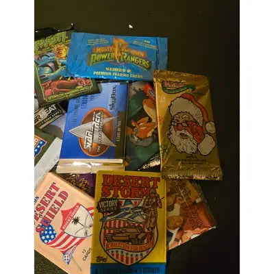 Vintage collection of assorted non-sport card packs for trading card enthusiasts