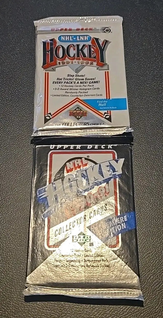 Two unopened Upper Deck hockey card packs from the 1990-91/1991-92 collection