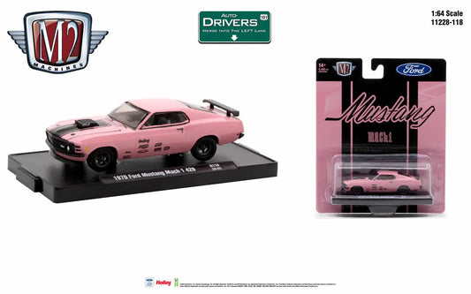 Pink Ford Mustang Mach model car with racing mods in M2 Machines packaging