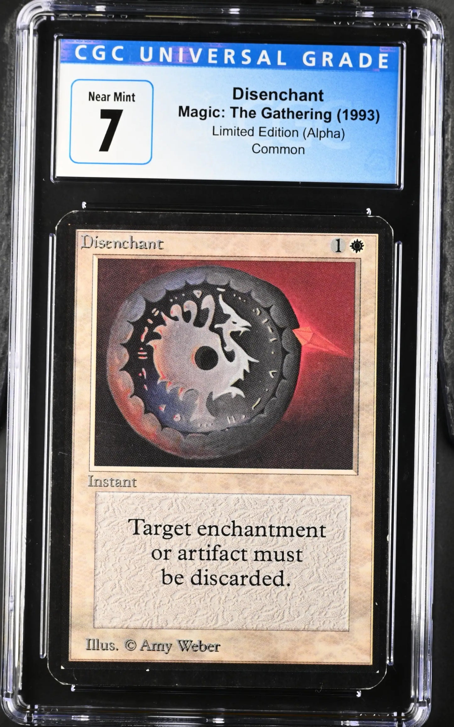 Graded Magic: The Gathering Disenchant card from Alpha Edition, a must for trading cards collectors