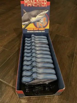 Box of Maneater Shark Bait Candy with shark body parts in JAWS Shark Tins