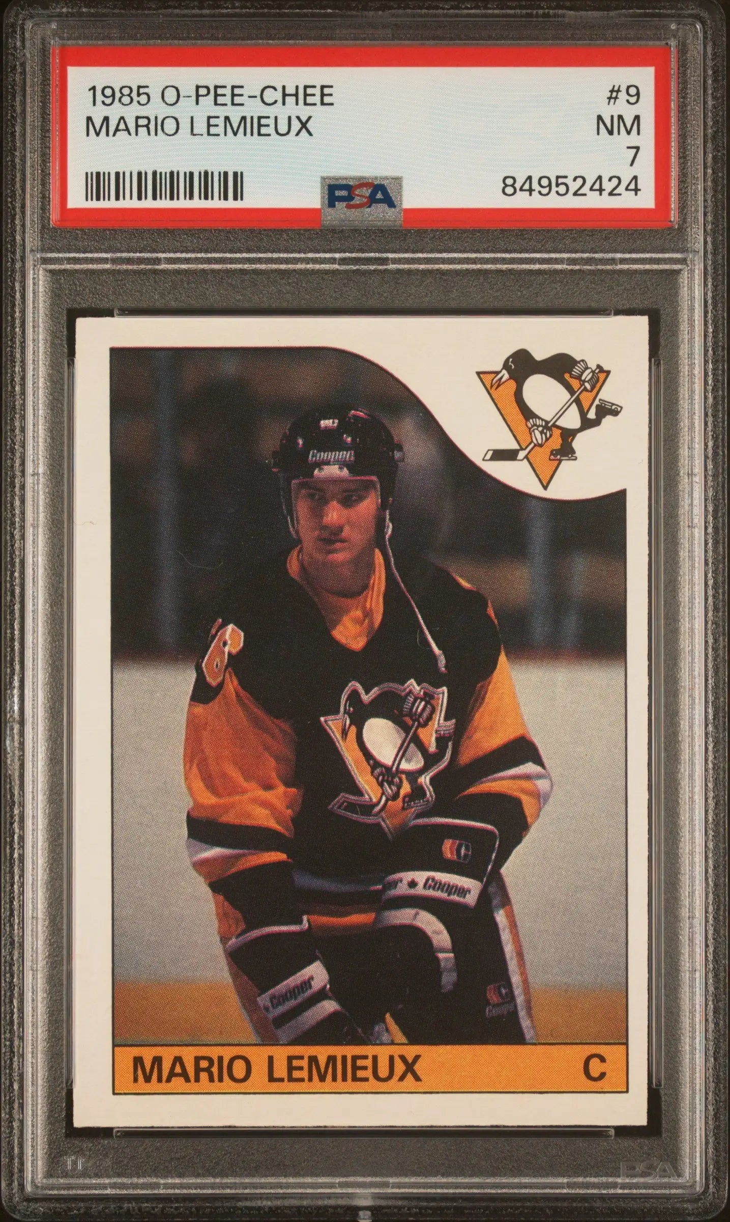 PSA-graded 1985 O-Pee-Chee trading card of Mario Lemieux in protective case