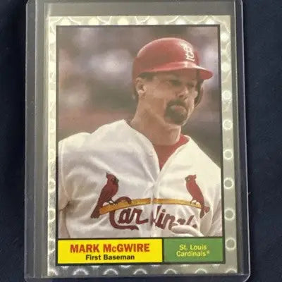 Mark McGwire baseball card with end cap foil and cap foil trim in protective sleeve
