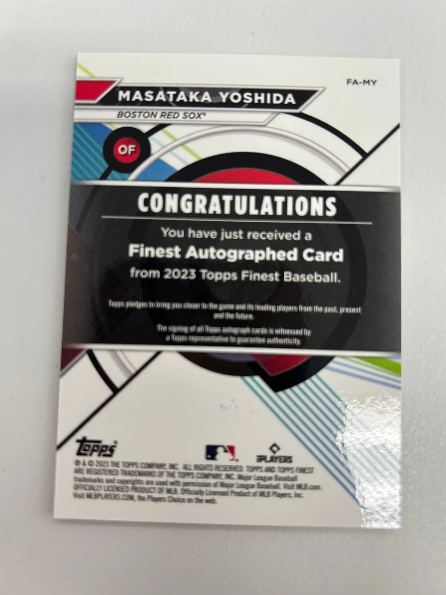 Back of Masataka Yoshida 2023 Topps Finest Orange Refractor Auto #14/25 card