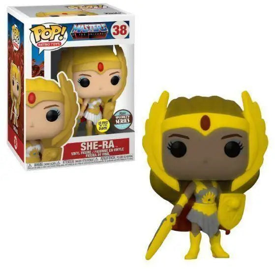 Glowing yellow She-Ra Funko Pop vinyl figure holding a sword from Masters of the Universe