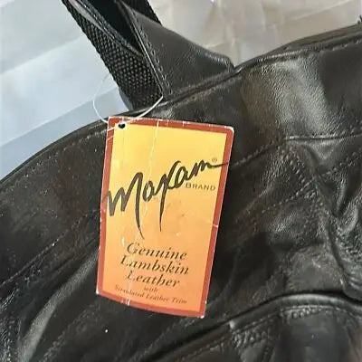 Maxam Black leather tote bag with brand tag, stylish large shoulder handbag
